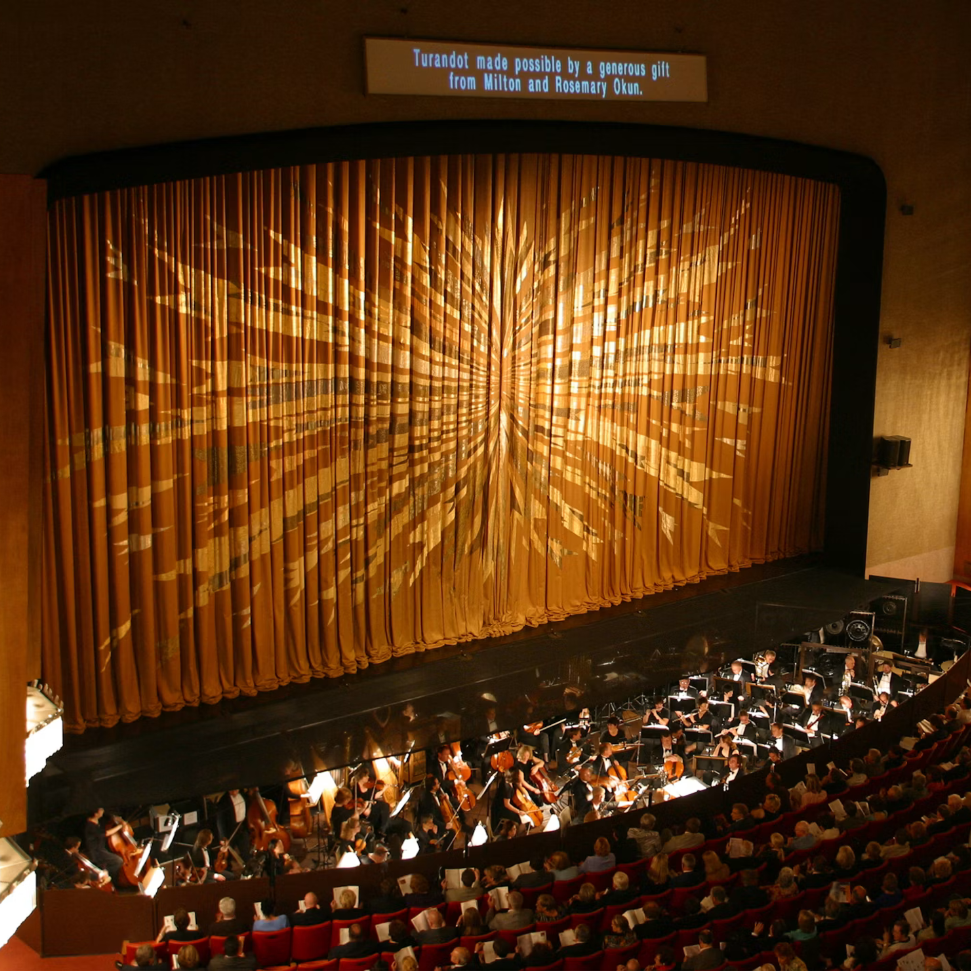 Dorothy Chandler Pavilion stage curtain and orchestra pit before a performance