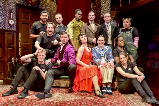 Production shot of The Play That Goes Wrong in London, showing cast pictorial.