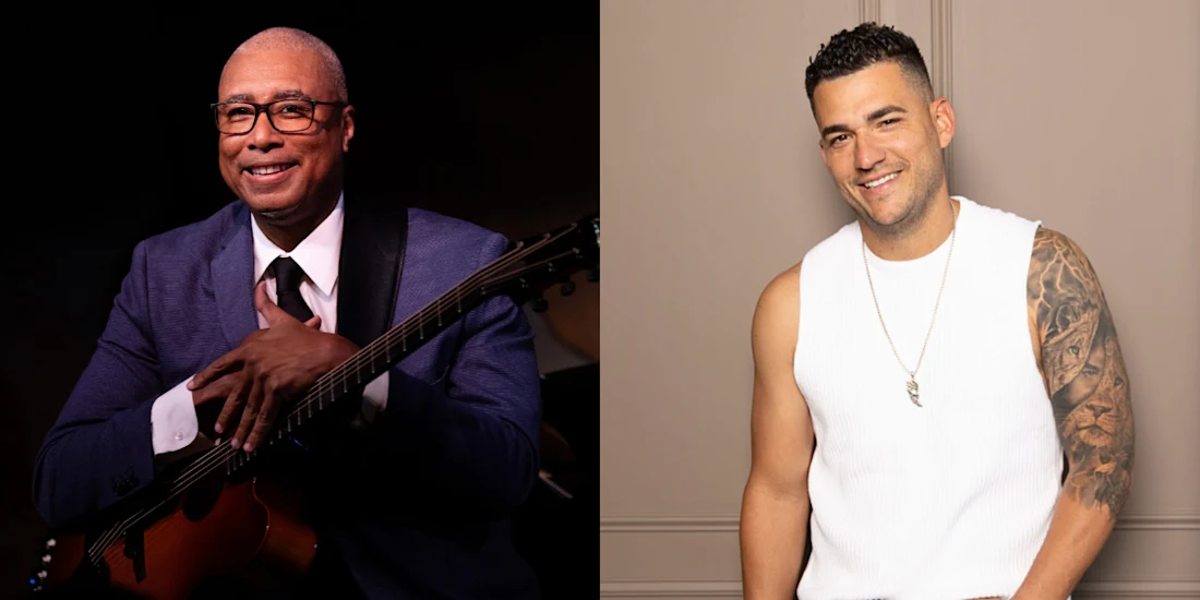 Two men are pictured side by side; the man on the left wears glasses and a suit holding a guitar, while the man on the right wears a sleeveless white shirt and displays a tattooed arm.