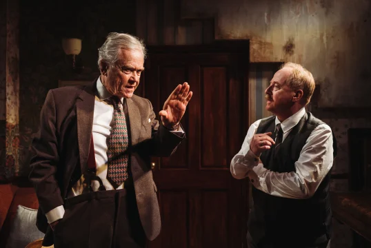 Production shot of Farm Hall in London, featuring David Yelland and Forbes Masson