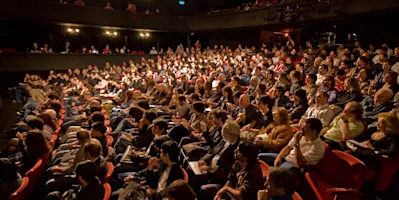 Photo credit: Audience fills the theatre (Photo by Wikimania 2009 on Flickr)