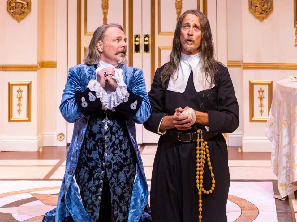 Production shot of Tartuffe in Los Angeles with Bo Foxworth as Orgon and Bruce Turk as Tartuffe.
