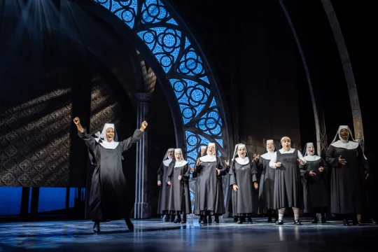 Production shot of Sister Act in London featuring Alexandra Burke and the company