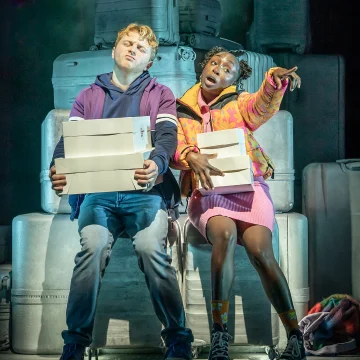 Production Image of Two Strangers Carry A Cake (Across New York) in London, featuring Sam Tutty and Dujonna Gift
