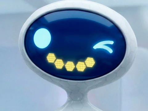 A white robot with a large oval screen displays a digital winking face and a smiling mouth made of yellow hexagons.