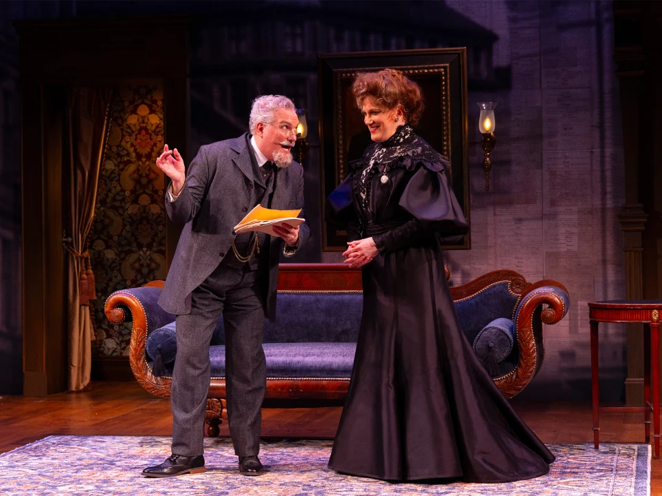 Production shot of Ibsen's Ghost: An Irresponsible Biographical Fantasy in New York City, with Christopher Borg as George Elsted and Charles Busch as Suzannah Ibsen.