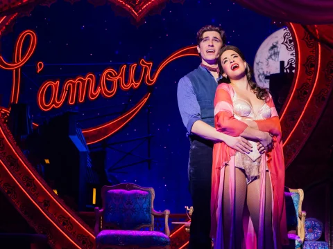 Production shot of Moulin Rouge in New York with Courtney Reed stars as Satine and Derek Klena as Christian.