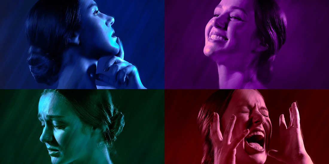 A collage of four portraits of a woman expressing different emotions: contemplation, happiness, sadness, and anger, each in a distinct colored lighting.