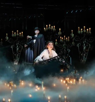 Production shot of The Phantom of the Opera in London, with Jon Robyns as Phantom and Lily Kerhoas as Christine.