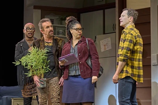 Production shot of Mrs. Doubtfire in London, with Gabriel Vick as Daniel Hillard, Kelly Agbowu as Wanda Sellner, Cameron Blakely as Frank Hilard and Marcus Collins as Andre Mayem.
