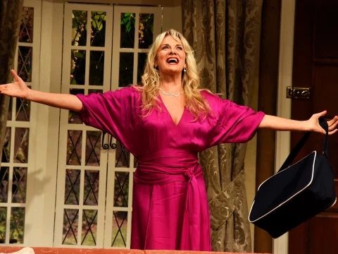 Production shot of Noises Off in London, with Tamzin Outhwaite as Belinda Blair.