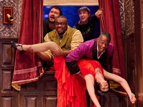 Production shot of The Play That Goes Wrong in London, featuring Jay Olpin and Hannah Sinclair Robinson.