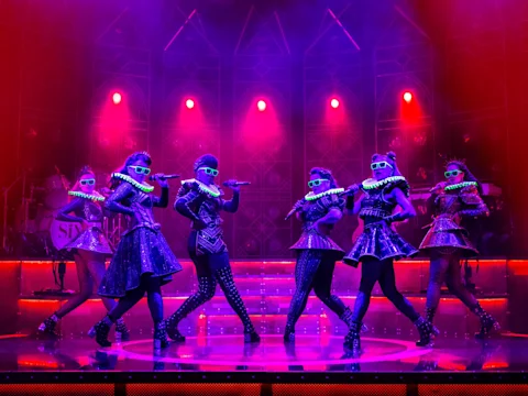Production shot of Six in London featuring the company.