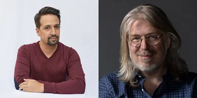 Two men are shown in a side-by-side portrait. The man on the left has short dark hair, a trimmed beard, and wears a maroon sweater. The man on the right has long gray hair, glasses, and a plaid shirt.