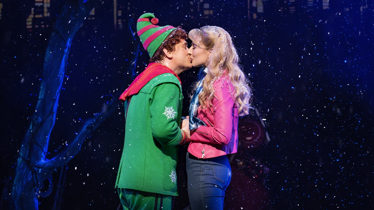 Production shot of ELF the Musical in London, with Matthew Wolfenden as Buddy the Elf and Georgina Castle as Jovie.