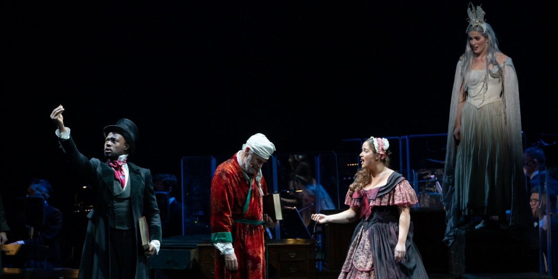 Sam Oladeinde, Brian Conley, Jacqueline Jossa, and Lucie Jones in A Christmas Carol at the Dominion Theatre.
