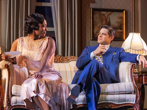 Production shot of The Great Gatsby on Broadway, with Jeremy Jordan and Aisha Jackson.
