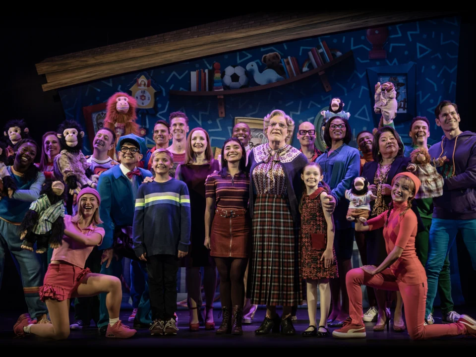 Production photo of Mrs. Doubtfire in San Francisco with Rob McClure as Daniel Hillard and the production ensemble.