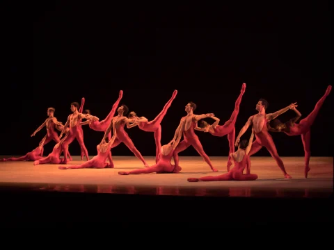Production photo of 10,000 Dreams: A Celebration of Asian Choreography in Washington, showing a group of ballet dancers perform a synchronized dance routine.
