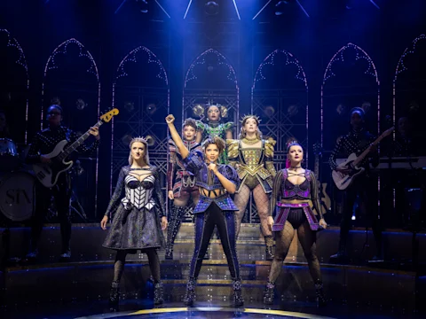 Production shot of Six in London featuring the company.