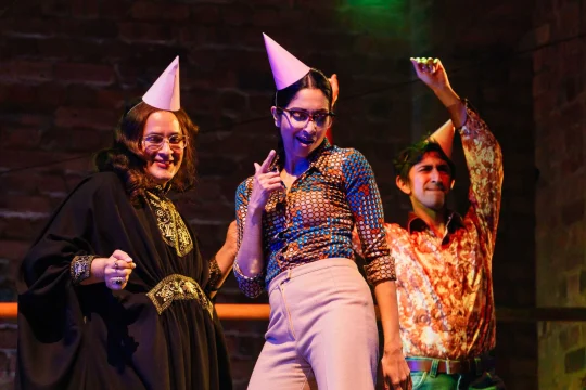 Production shot of The Buddha of Suburbia in Stratford featuring Natasha Jayetileke, Deven Modha and Simon Rivers