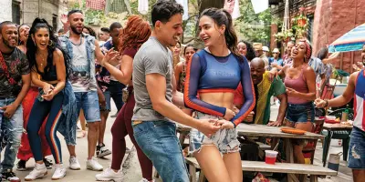 Photo credit: Cast of In The Heights (Photo by Warner Bros. Pictures/Macall Polay)