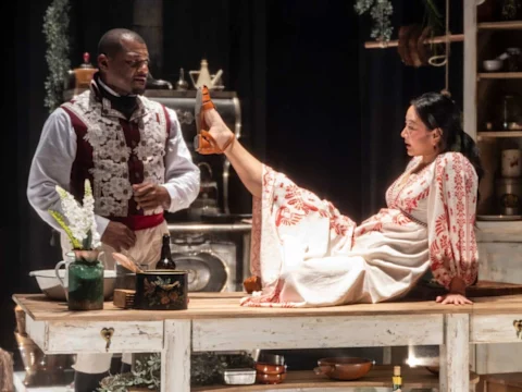 A man and woman in a dress.