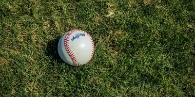 Photo of a baseball on grass