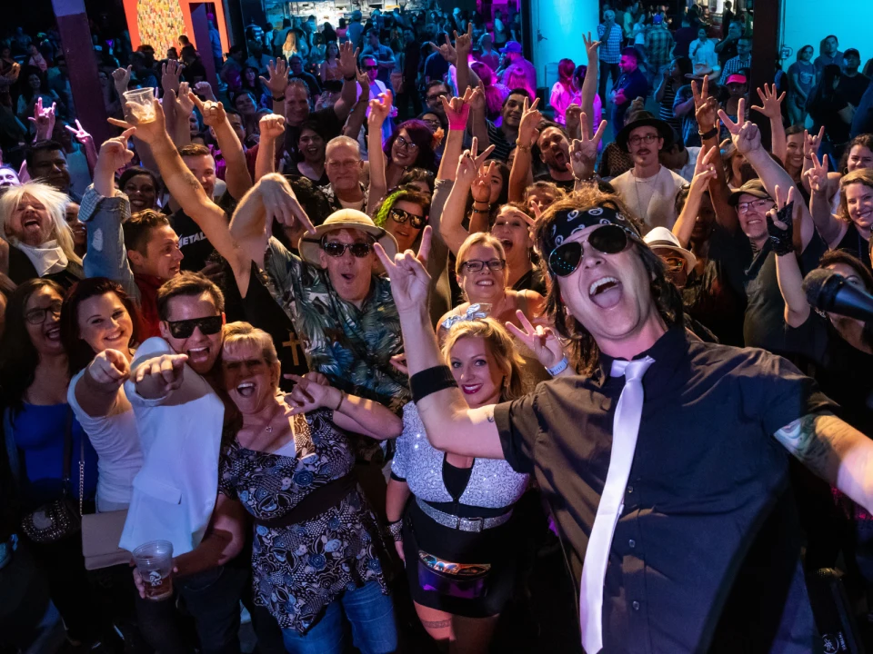 Production shot of Roaring Nights in Los Angeles, showing audience selfie.