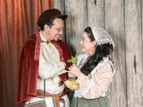 Production photo of Neil Simon's Fools in California with Miles Garcia as Leon and Lyndsay Palmer as Sophia Zubritsky.