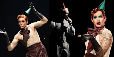 Three performers in party hats, makeup, and theatrical costumes pose and perform on stage under dramatic lighting.