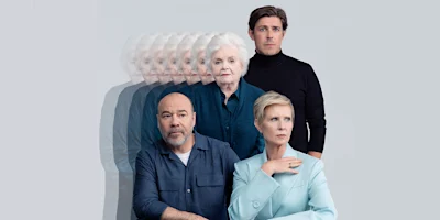 Four people pose against a light background; the older woman appears multiple times in a fading effect, standing behind the other three who sit or stand in front.