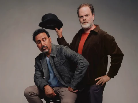 Production shot of Waiting for Godot in Los Angeles, with Aasif Mandvi as Estragon and Rainn Wilson as Vladimir.