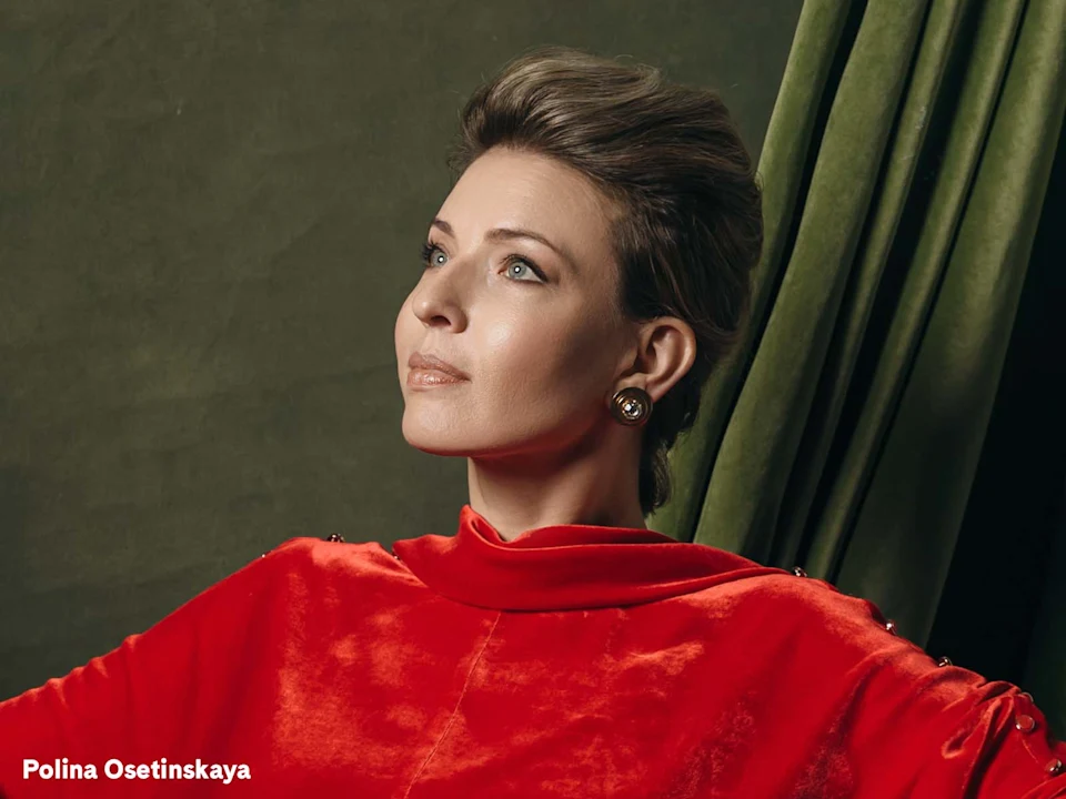 A woman in a red velvet top with short, styled hair looks upward against a green background. The name "Polina Osetinskaya" appears in white text at the bottom left.