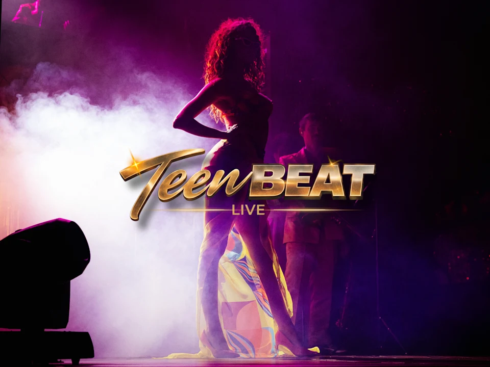 A performer stands on stage in dramatic lighting with "Teen BEAT LIVE" in gold text overlaid on the image.