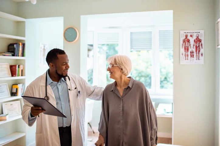 Doctor talking to patient