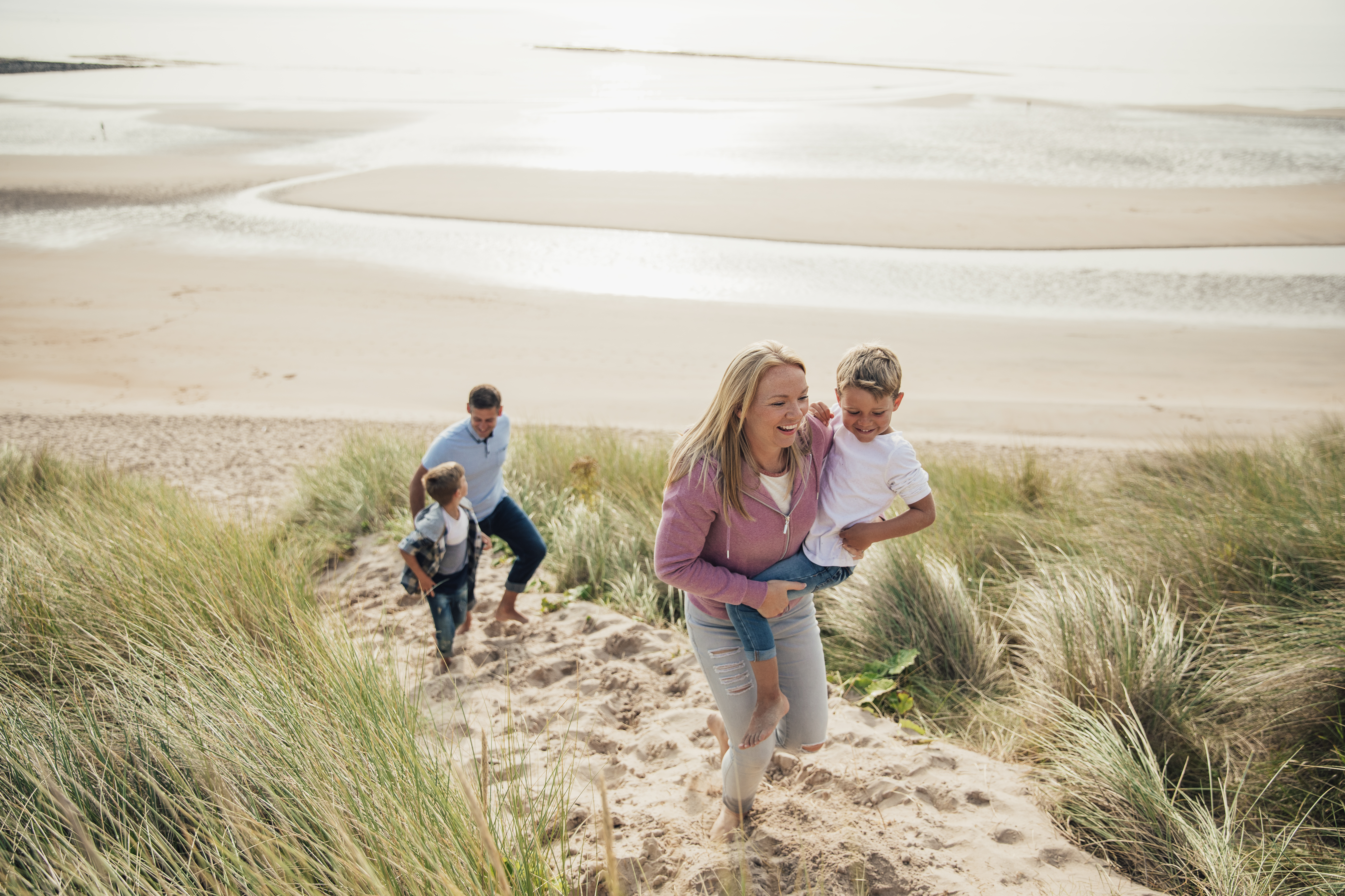 A family walking on the beach