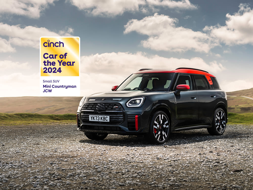 MINI Countryman John Cooper Works parked outdoors, shown with a ‘cinch Car of the Year 2024’ award badge.
