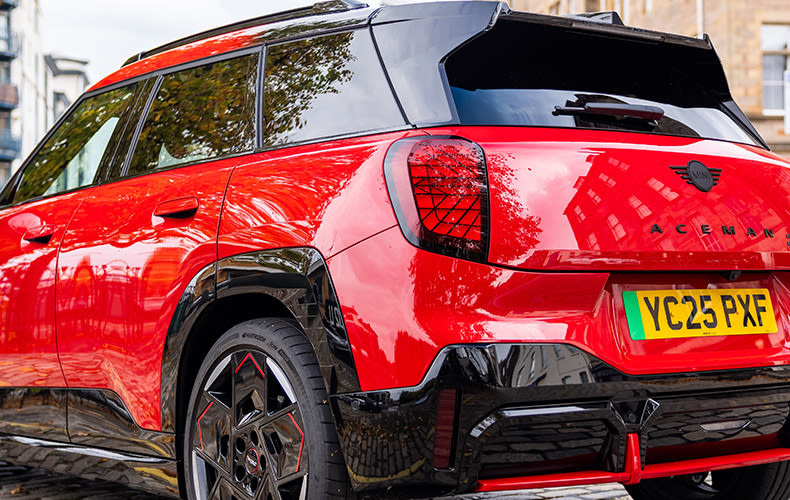 Back view of a red MINI Aceman JCW