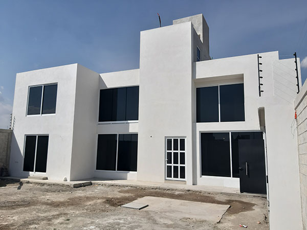 Construcción de torres departamentales y casas residenciales