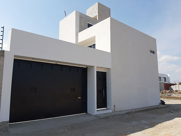 Construcción de torres departamentales y casas residenciales