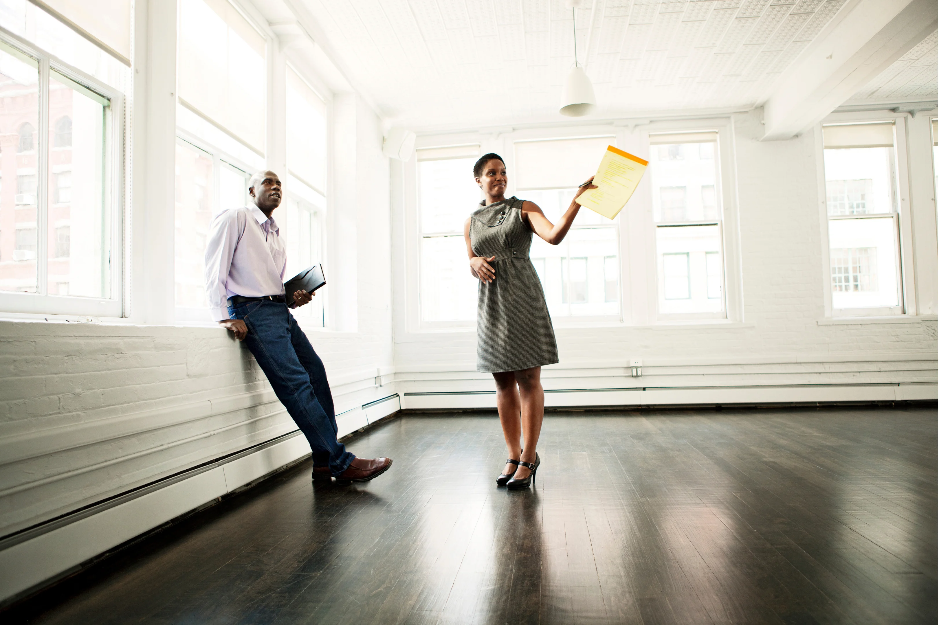 Agent showing building to client 