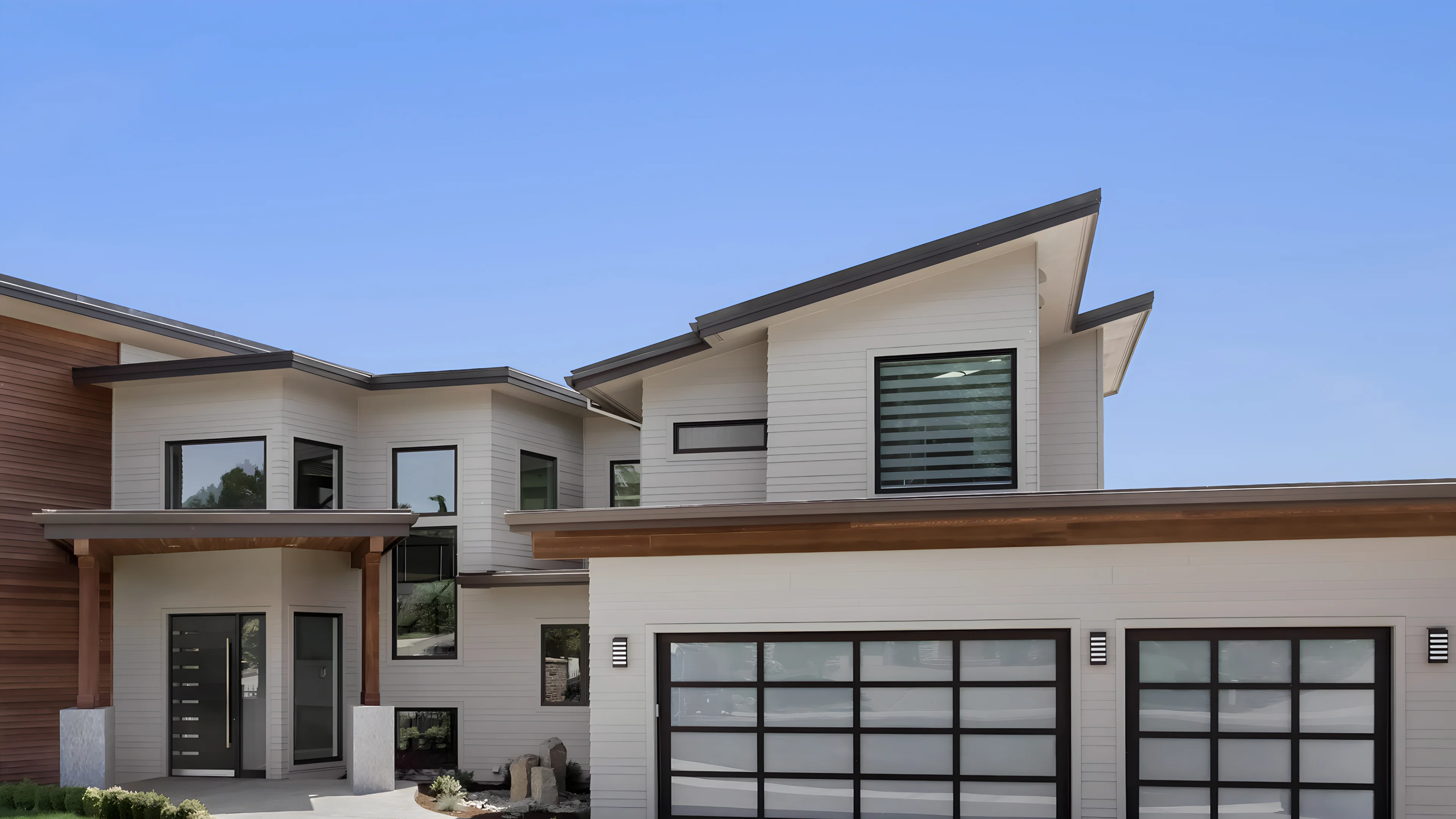 Home with angular roof and garage