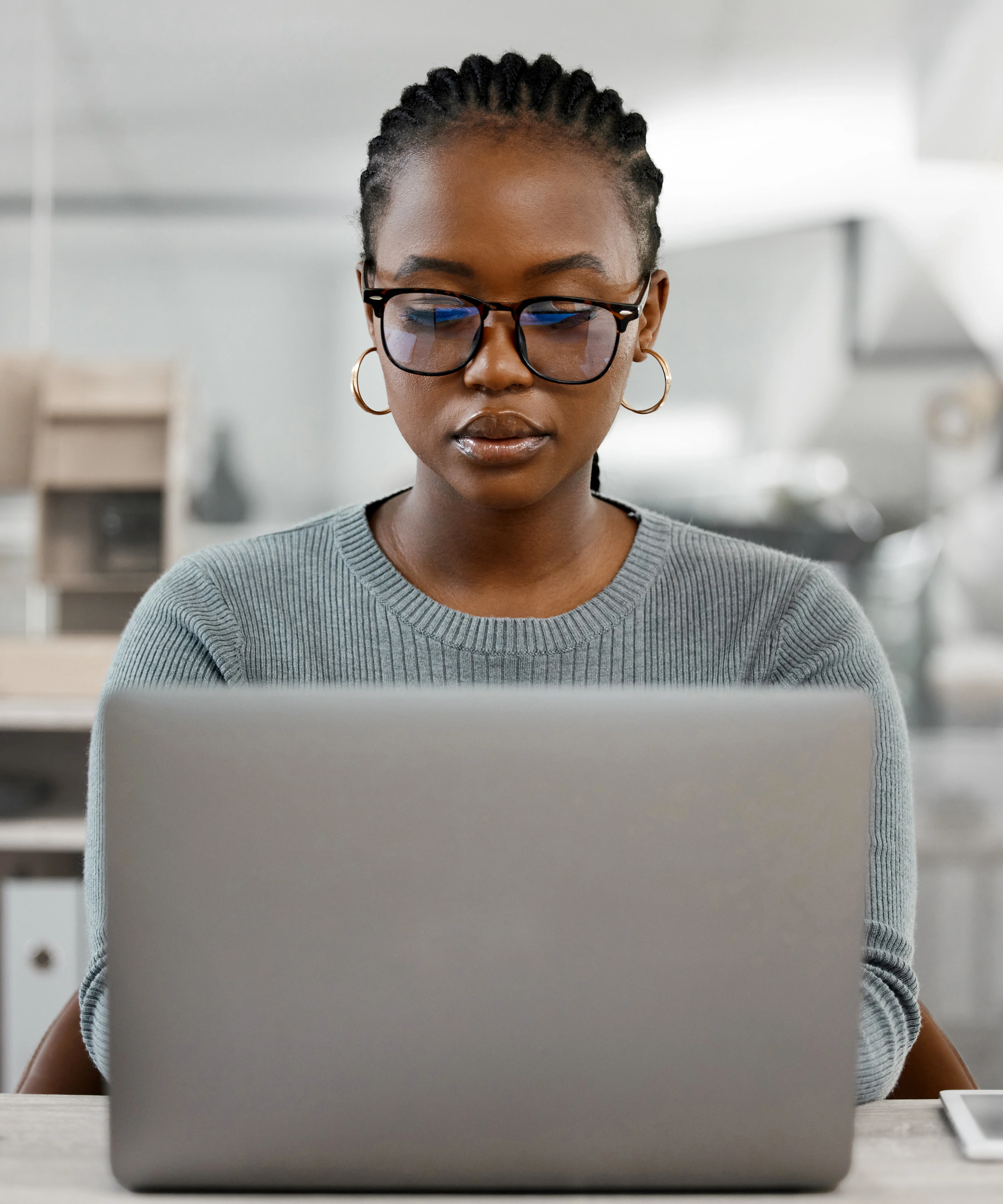 Woman looking at computer