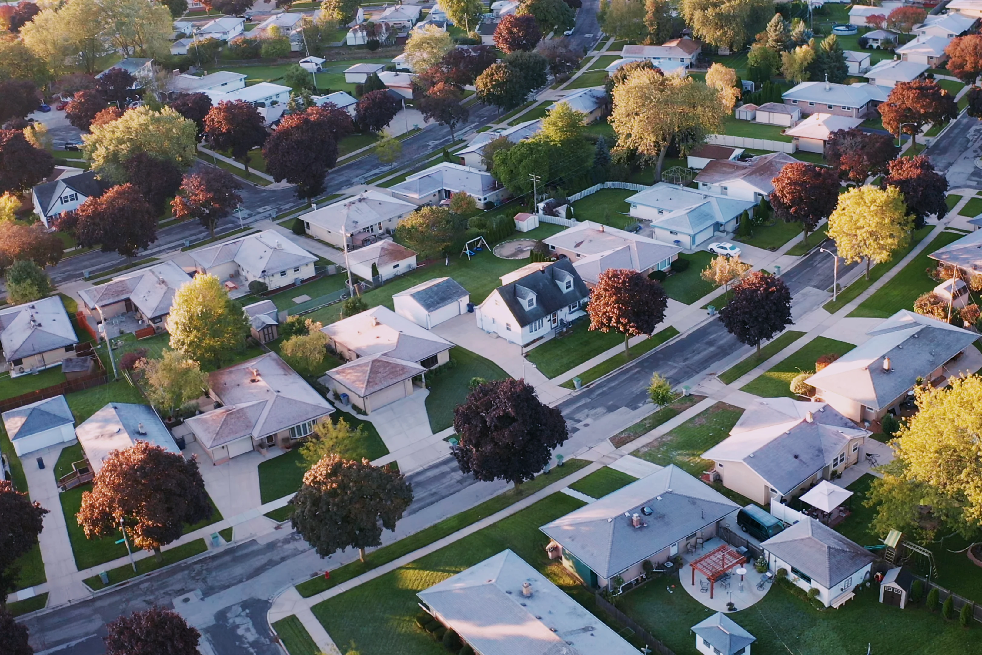 Sky view of homes with yards
