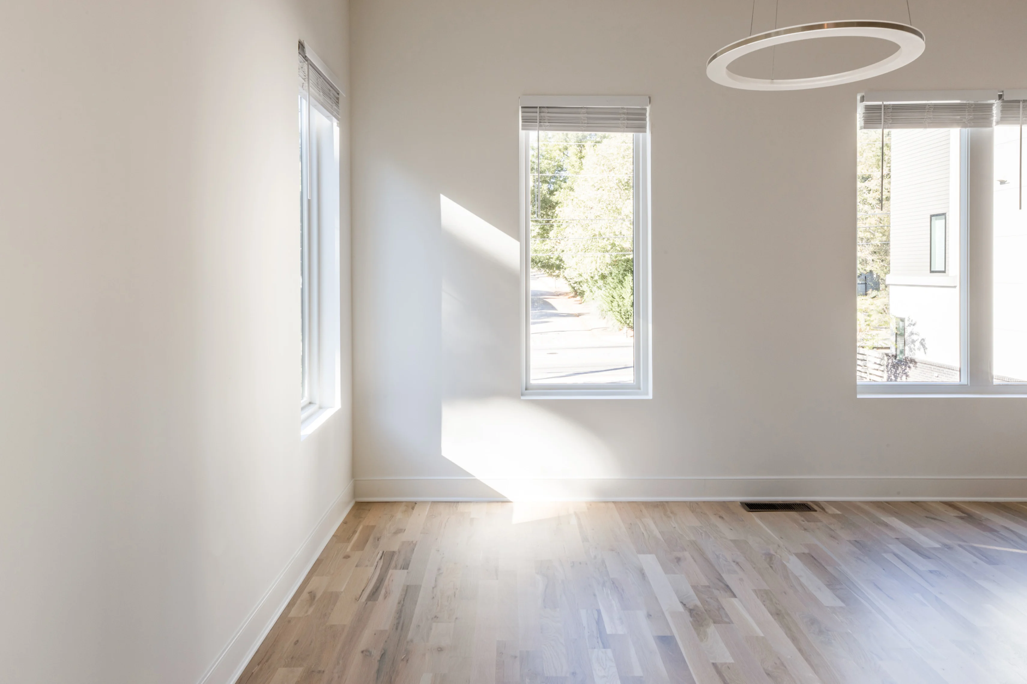 Well lit, sunny, empty room