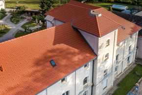 Historisches Gebäude Pottenbrunn eingedeckt mit dem Bramac Markant DachSystem
