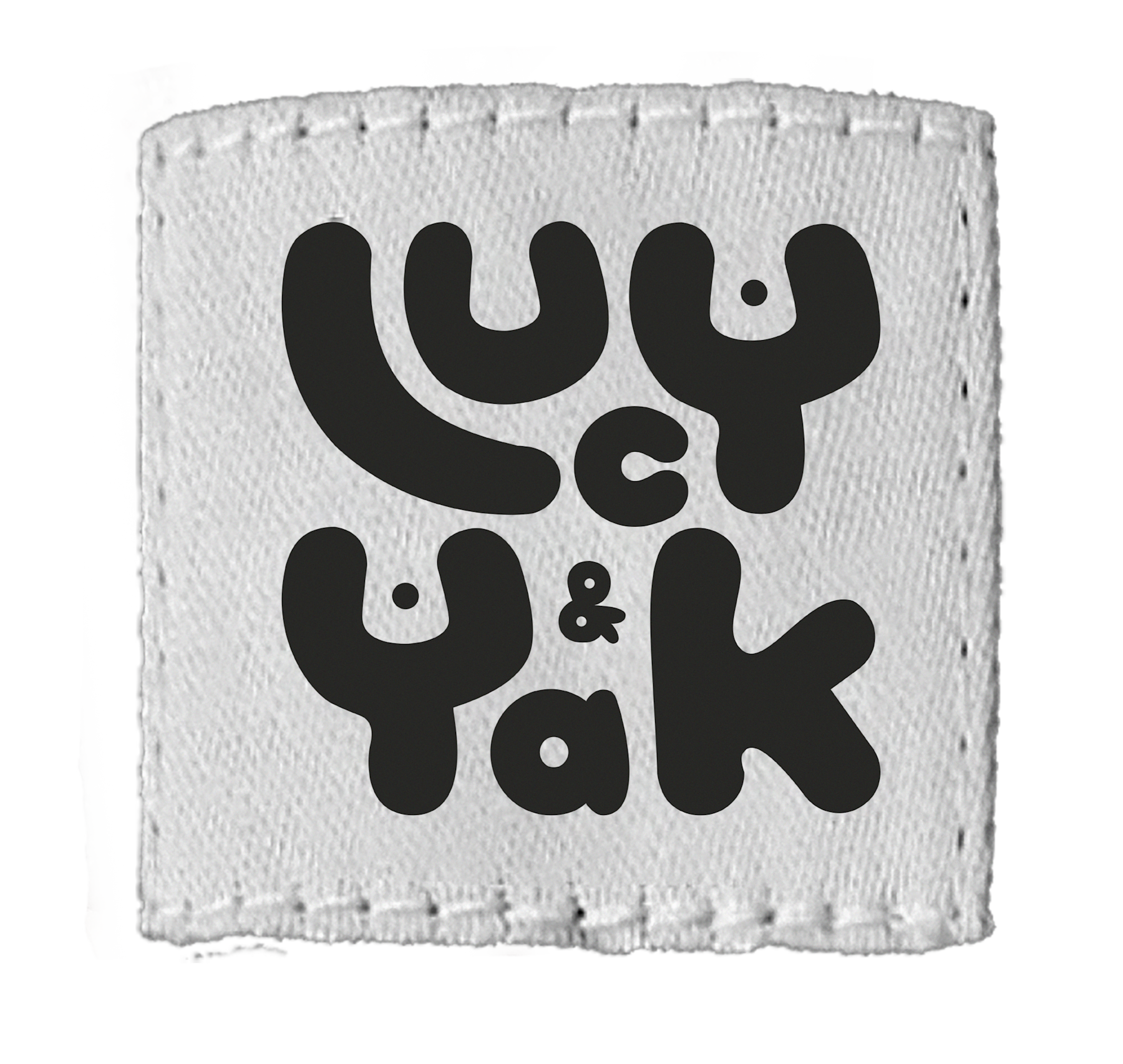 Lucy & Yak logo, with big bold letters that look like they have been printed onto a fabric patch.