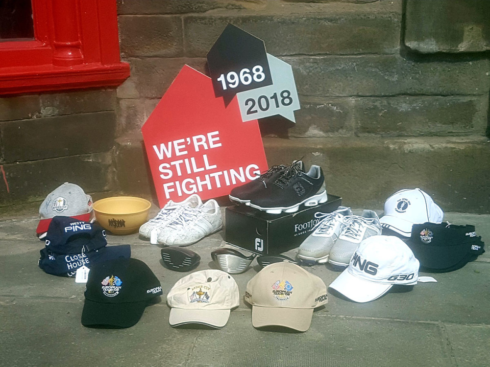 A collection of golfer Lee Westwood memorabilia, including hats and trainers, that are being auctioned to raise money for Shelter Scotland.