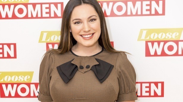 Kelly Brook admits she is trying to 'lose weight' from her 34FF breasts 